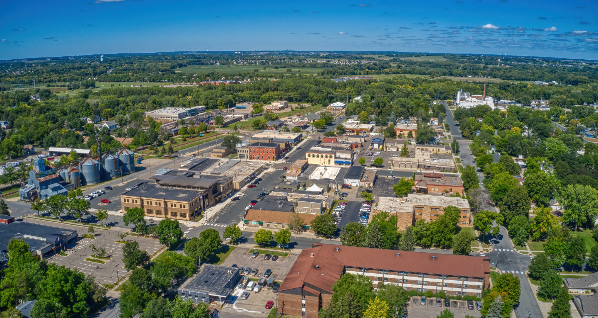 A city with many buildings and trees.