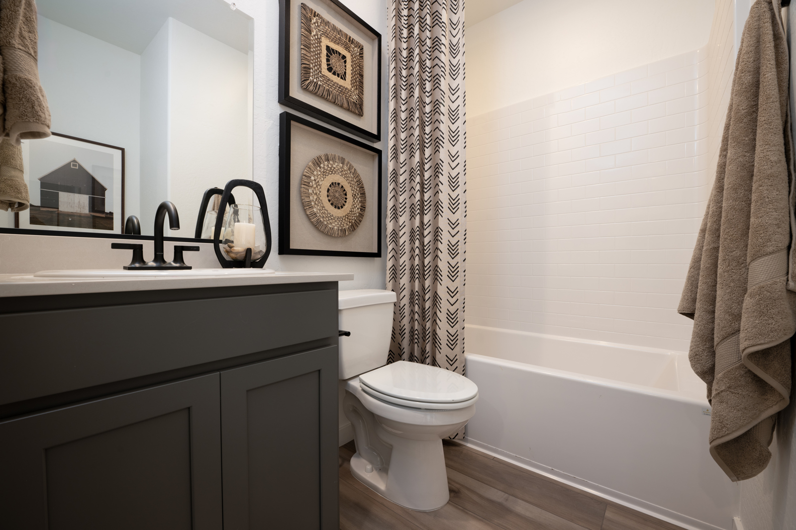 A bathroom with a toilet and sink.