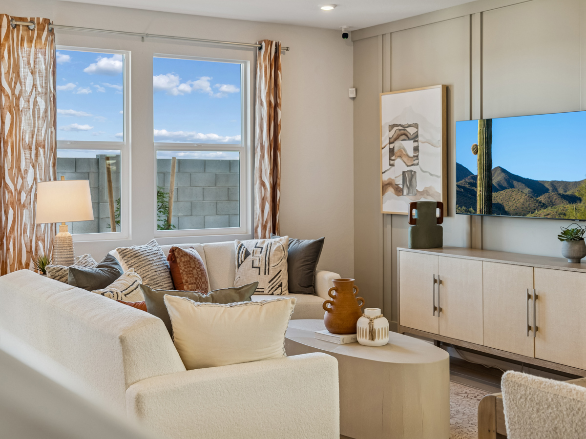 A living room with a large window.