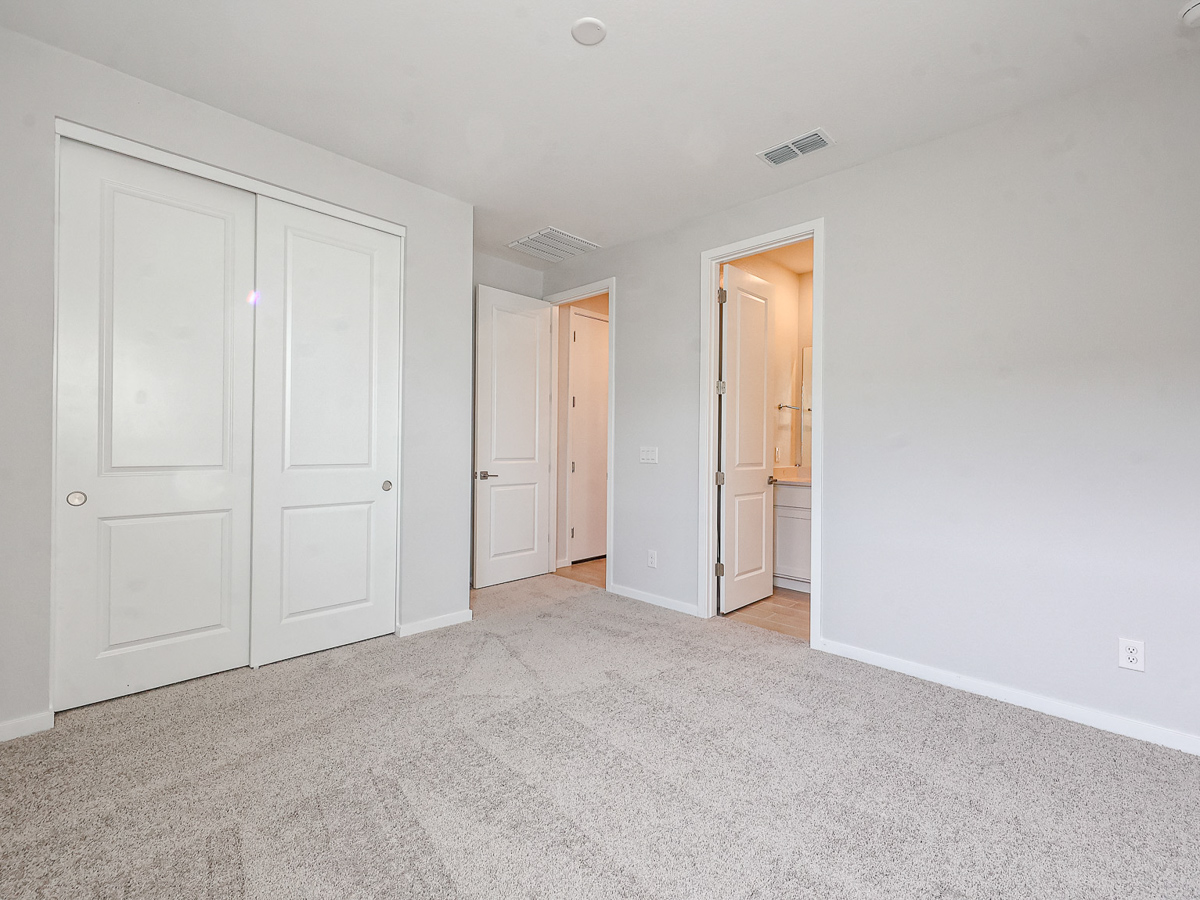 A room with white doors.