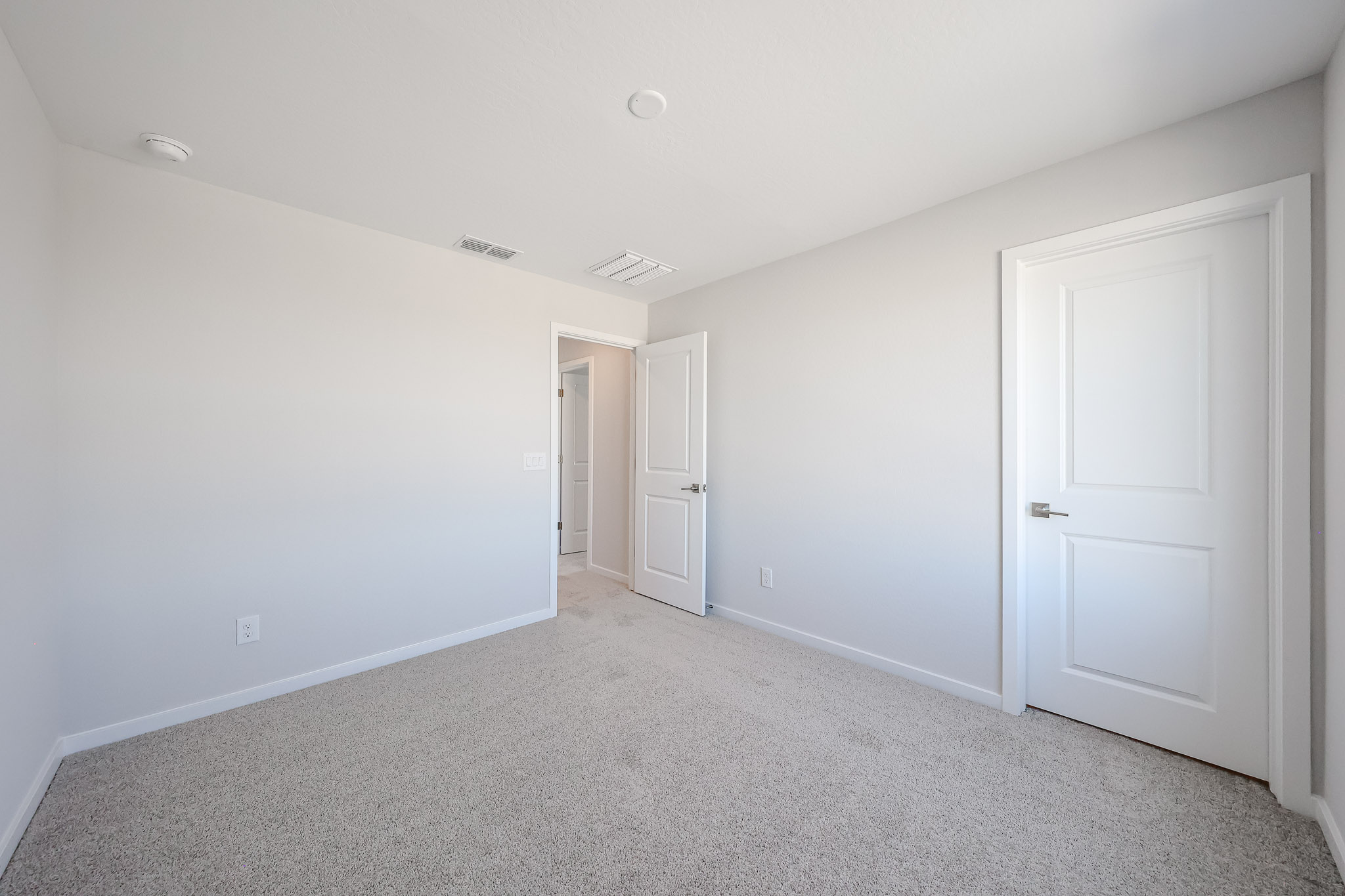 A room with white doors.