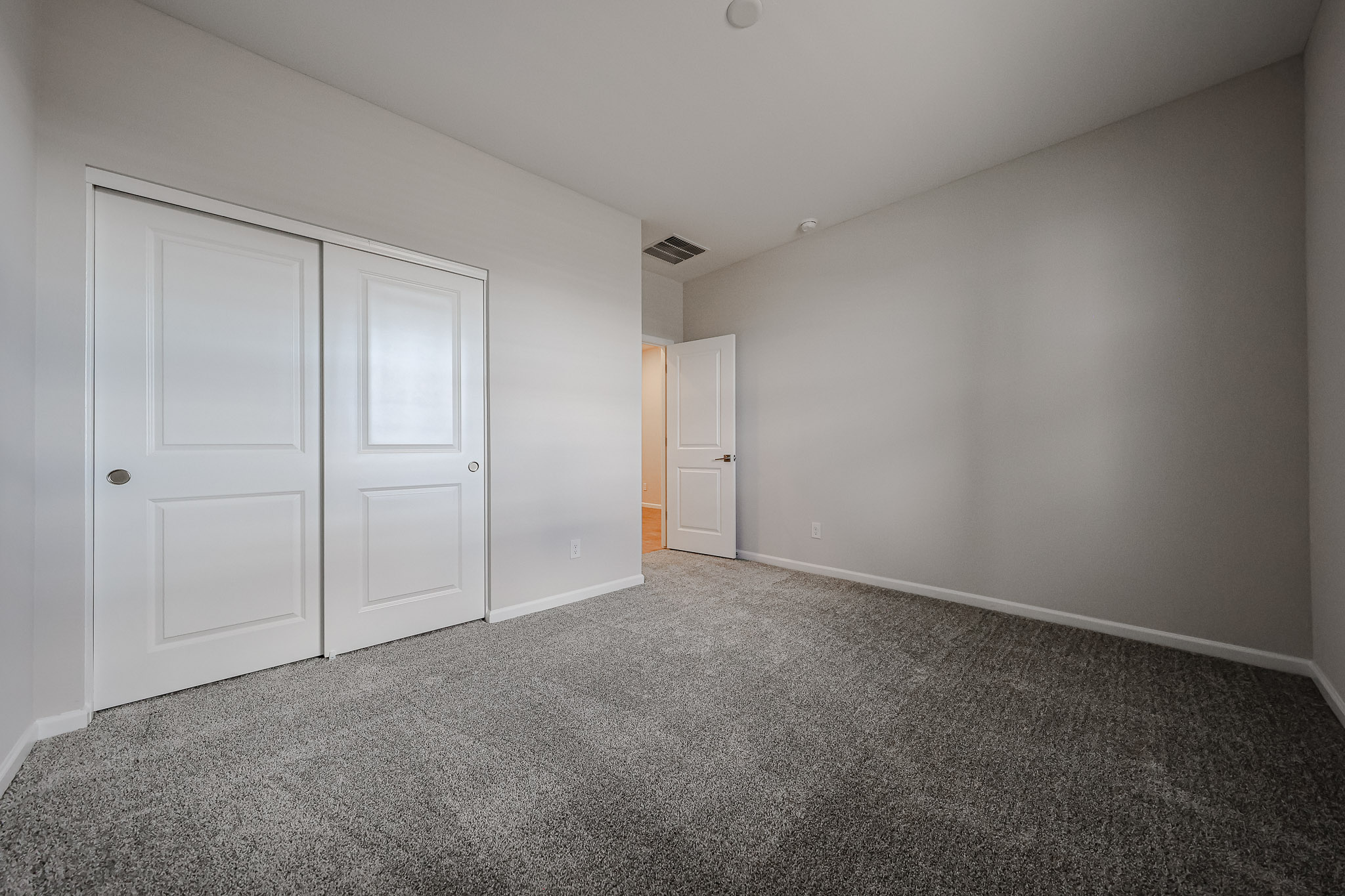 A room with white doors.