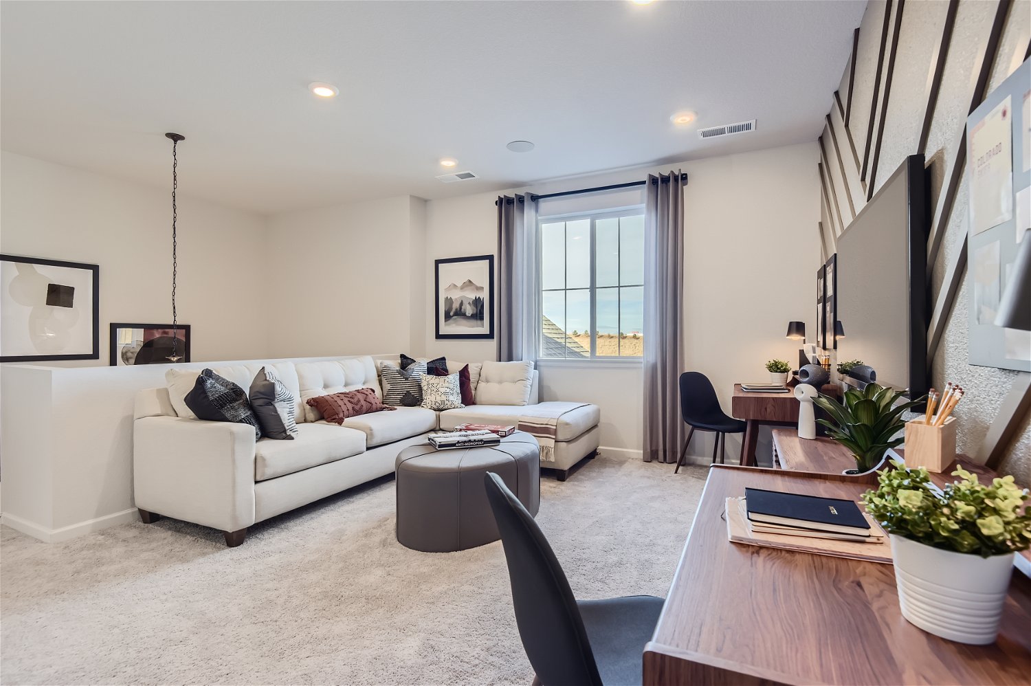 A living room with a large window.