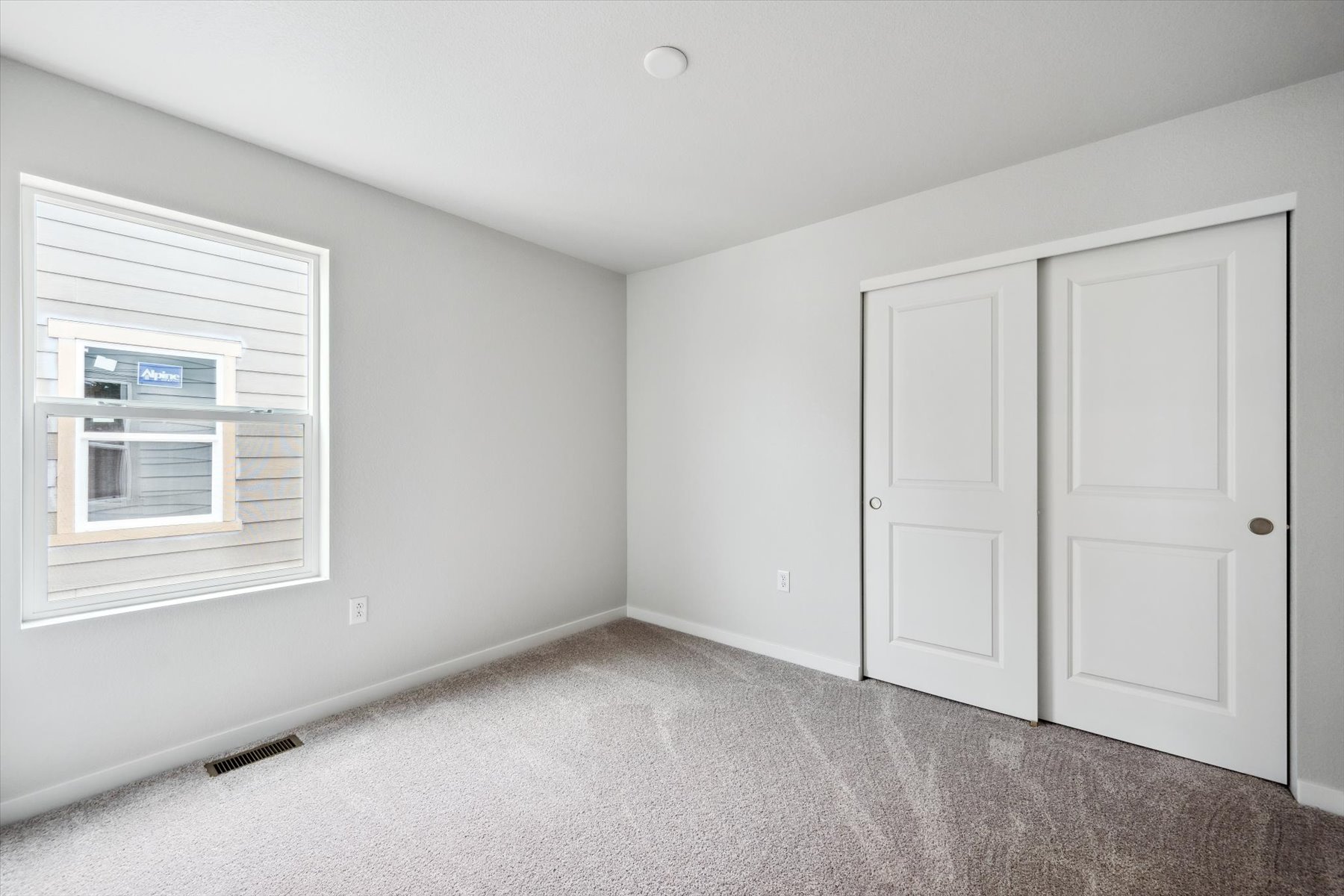 A room with white doors.