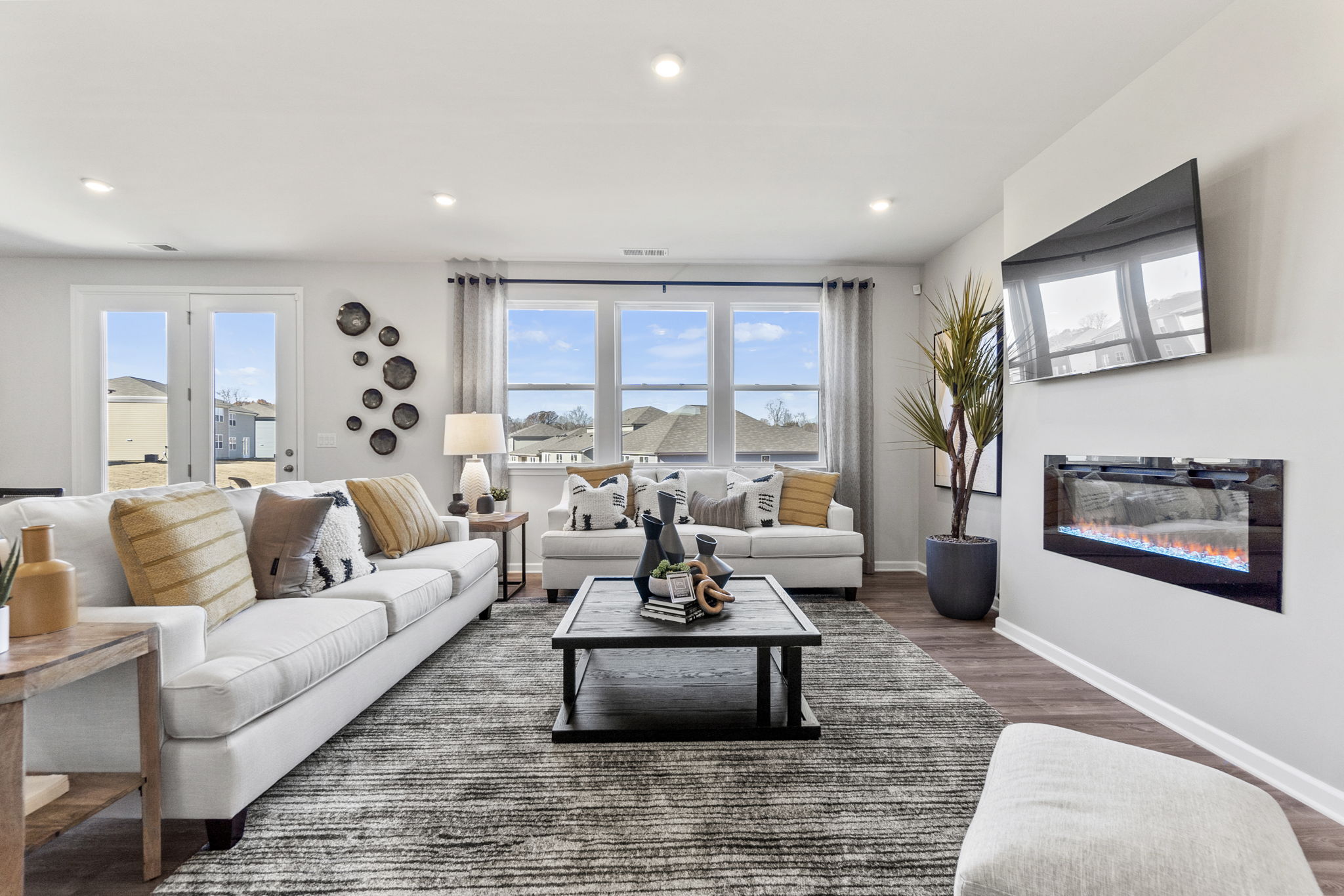 A living room with a large window.
