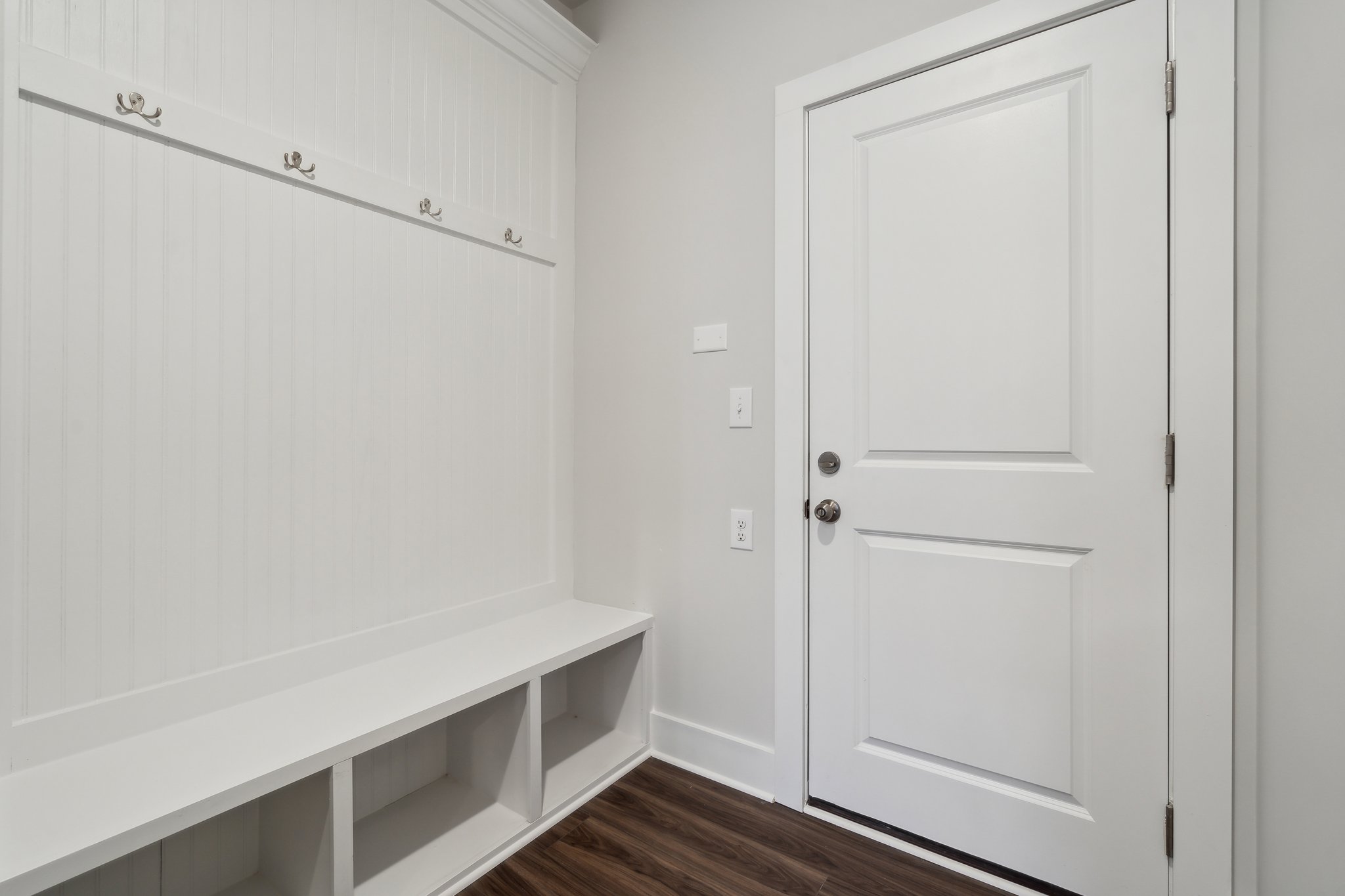A white door in a room.