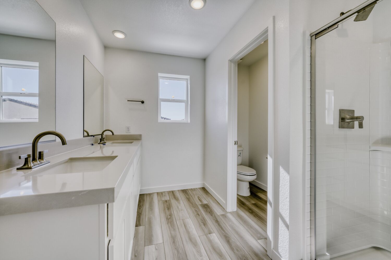 A bathroom with a standup shower.