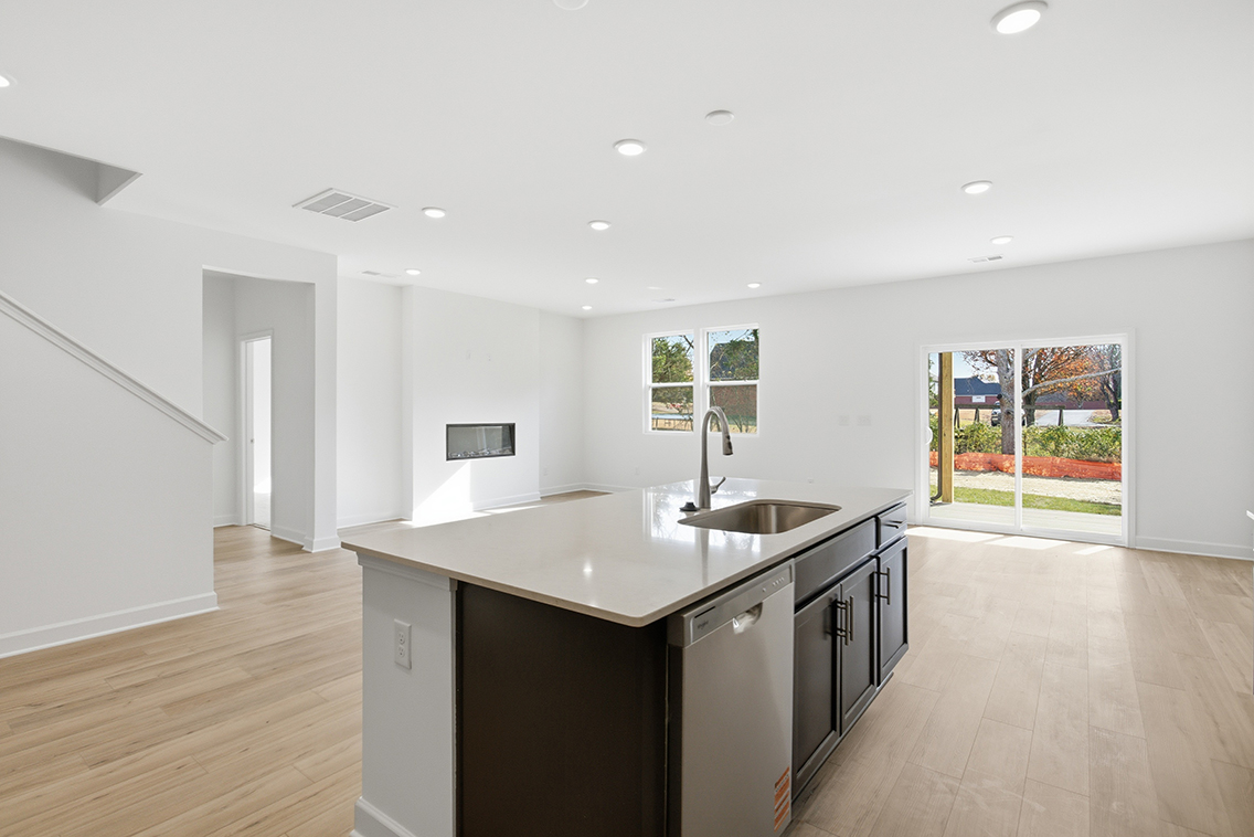 A kitchen with a large island.
