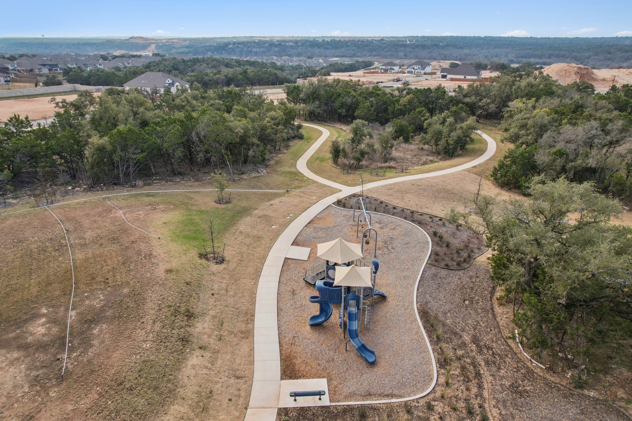A small play structure in a field.