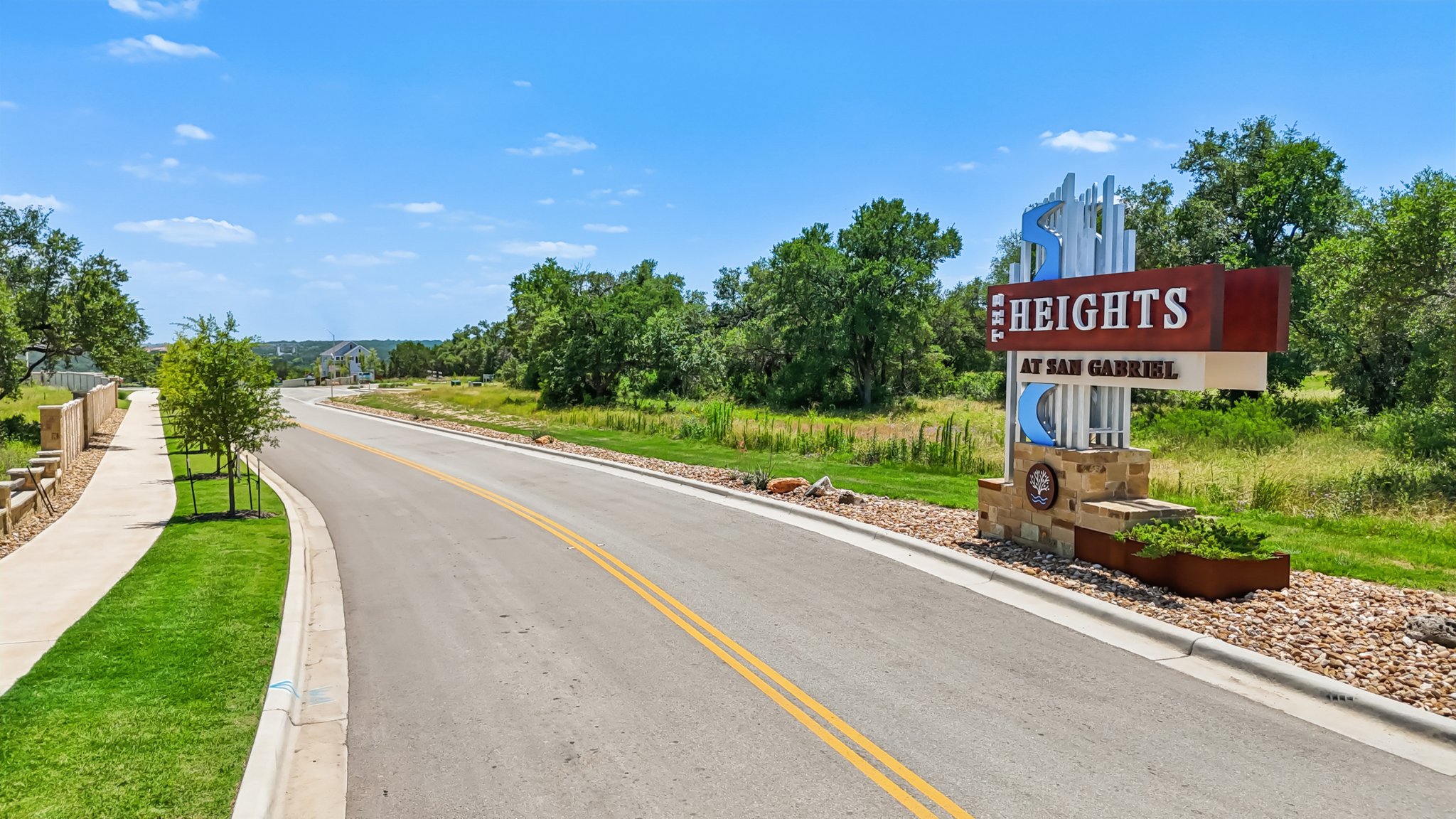 A road with a sign on it.