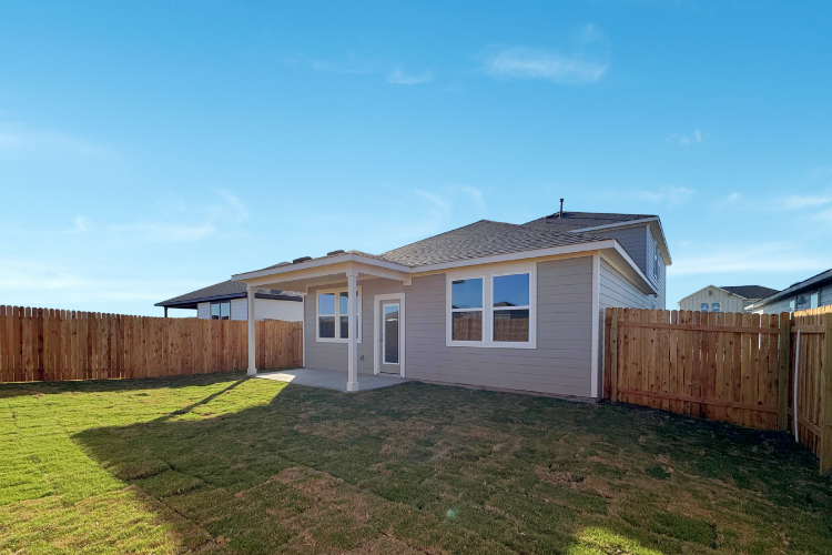 A house with a fence around it.