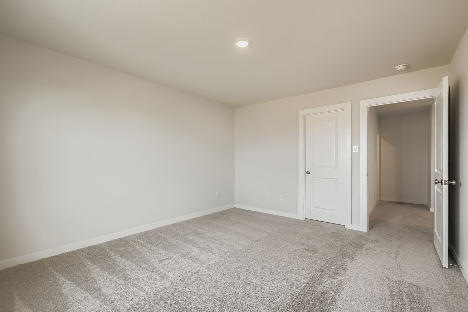 A room with white doors.