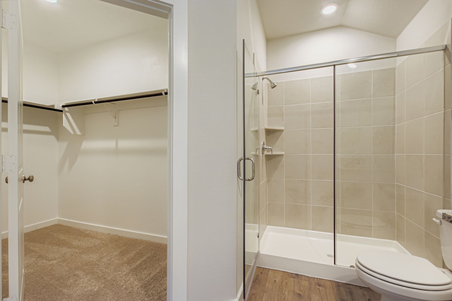 A bathroom with a glass shower.