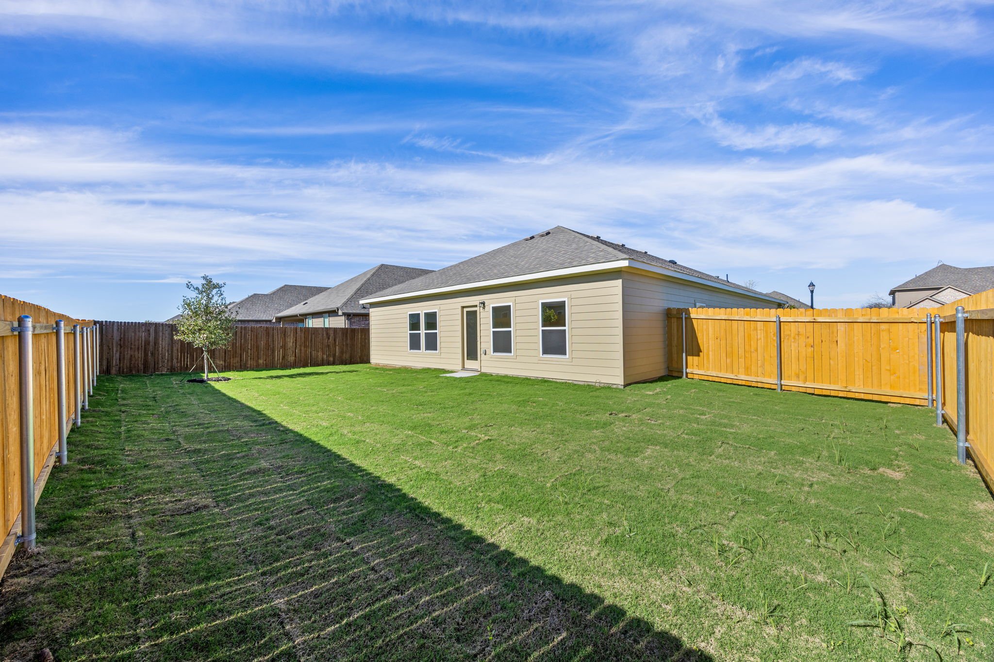 A house with a fence around it.