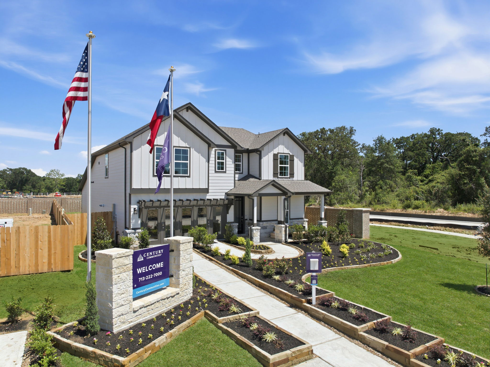 A house with flags in the front.