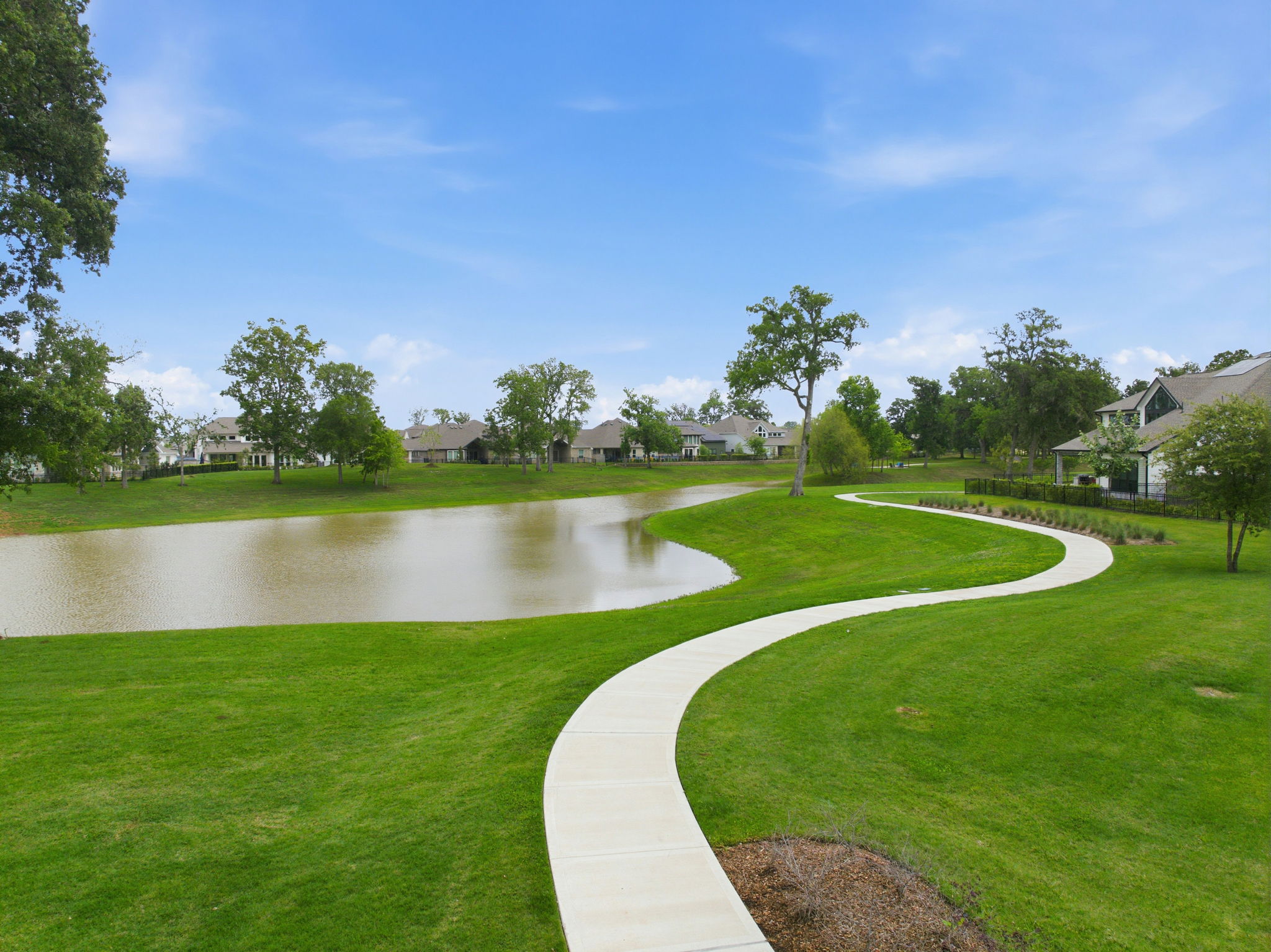 A pond in a park.