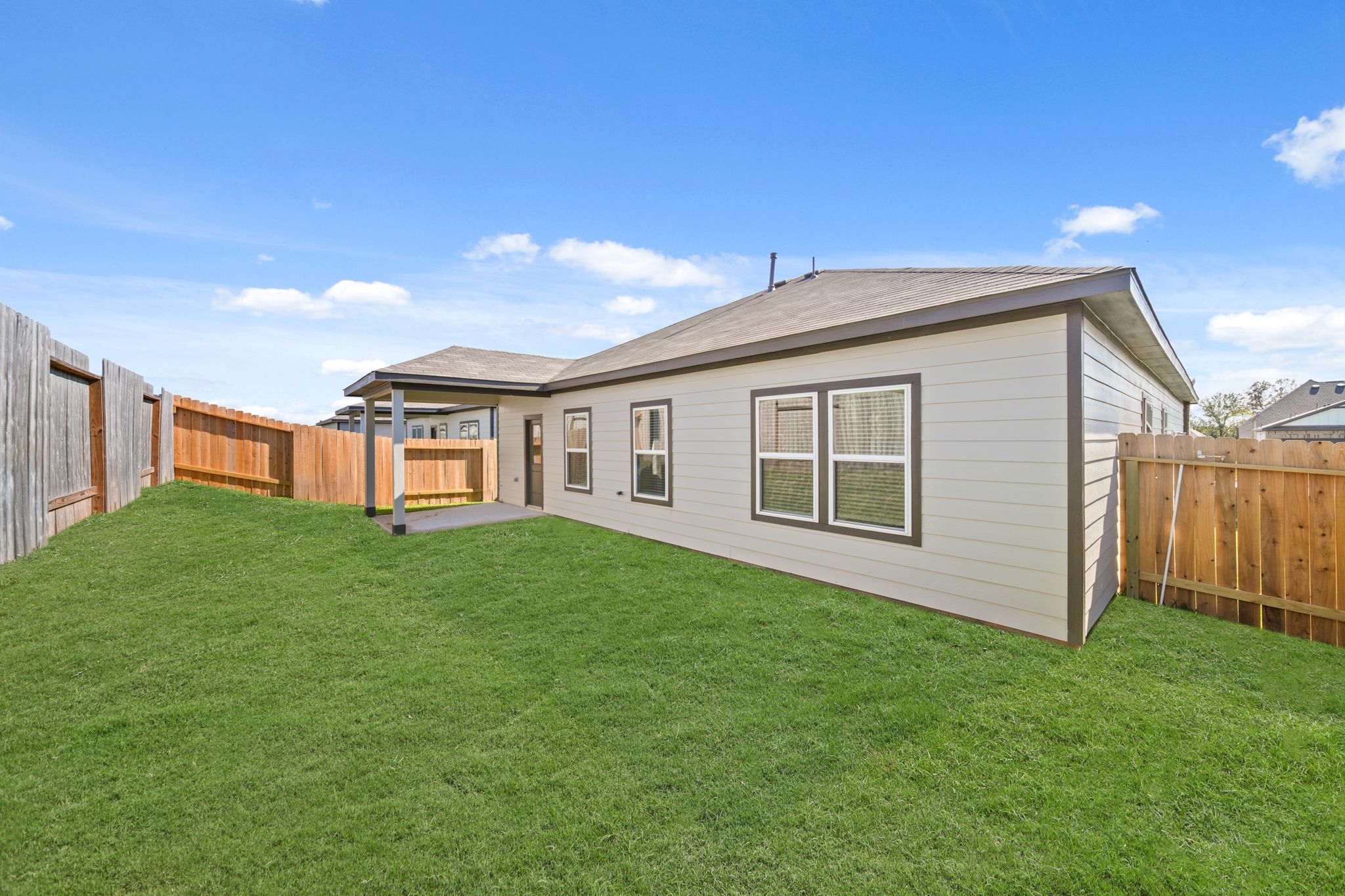 A house with a fence around it.