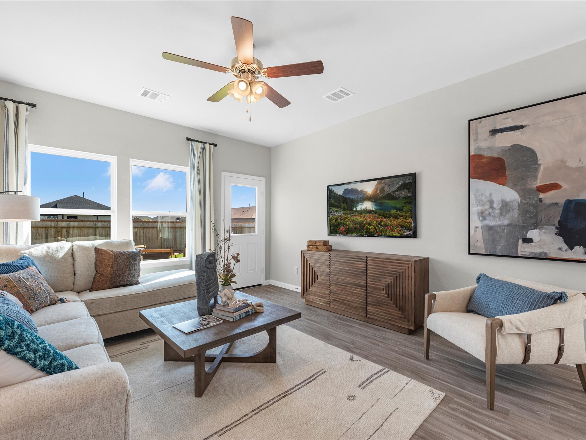 A living room with a large window.