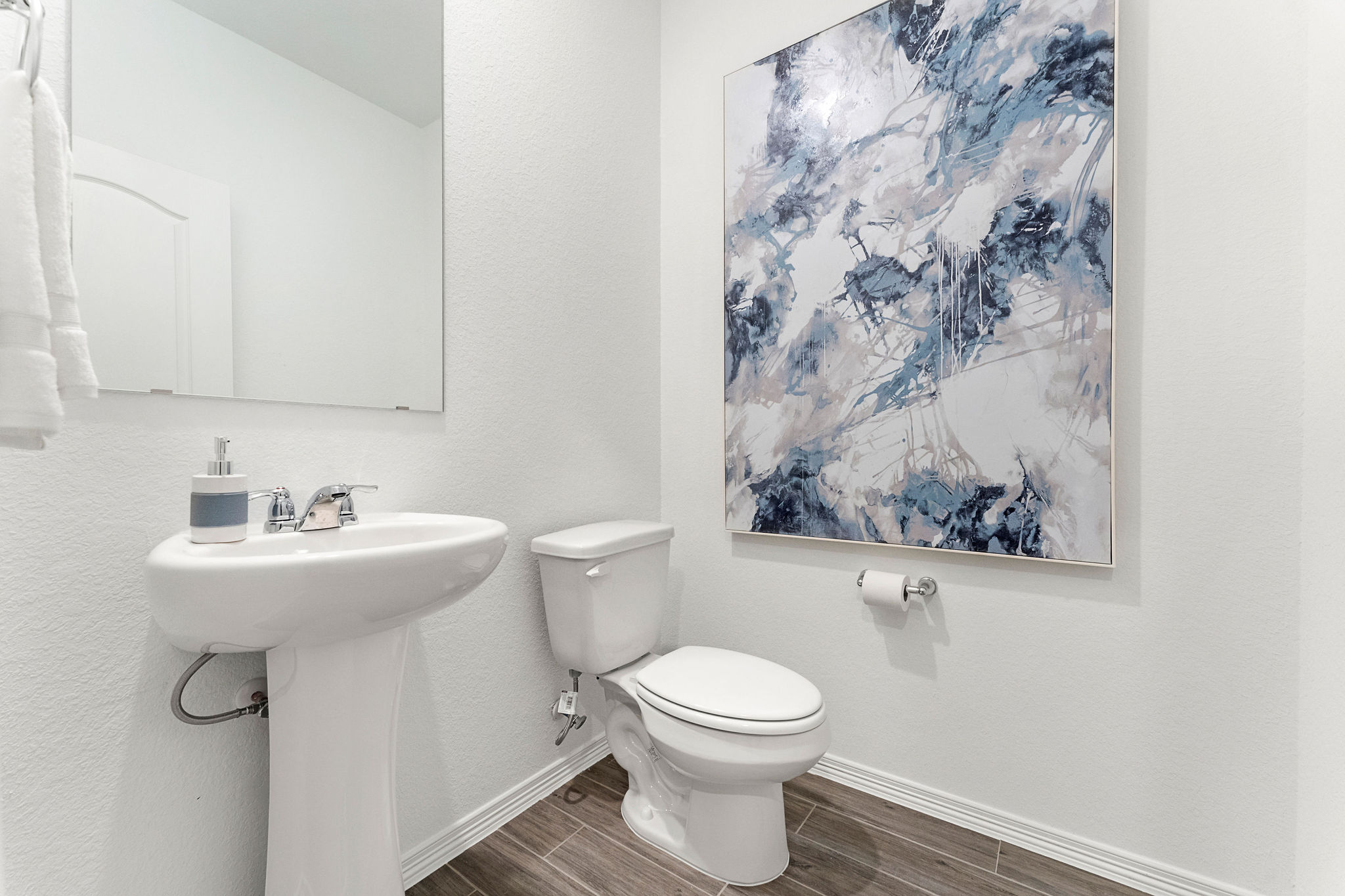 A bathroom with a large map on the wall.