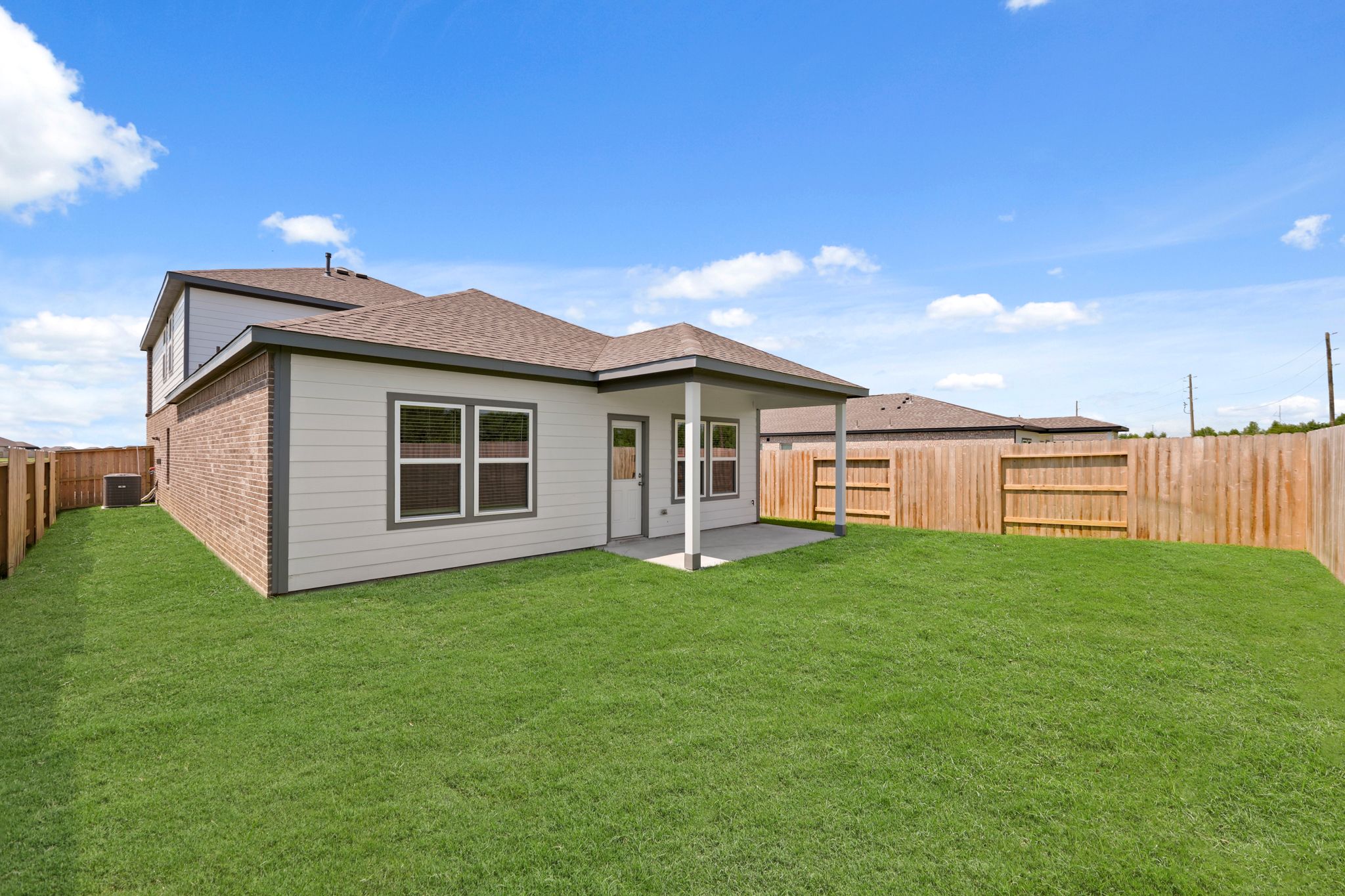 A house with a fence around it.
