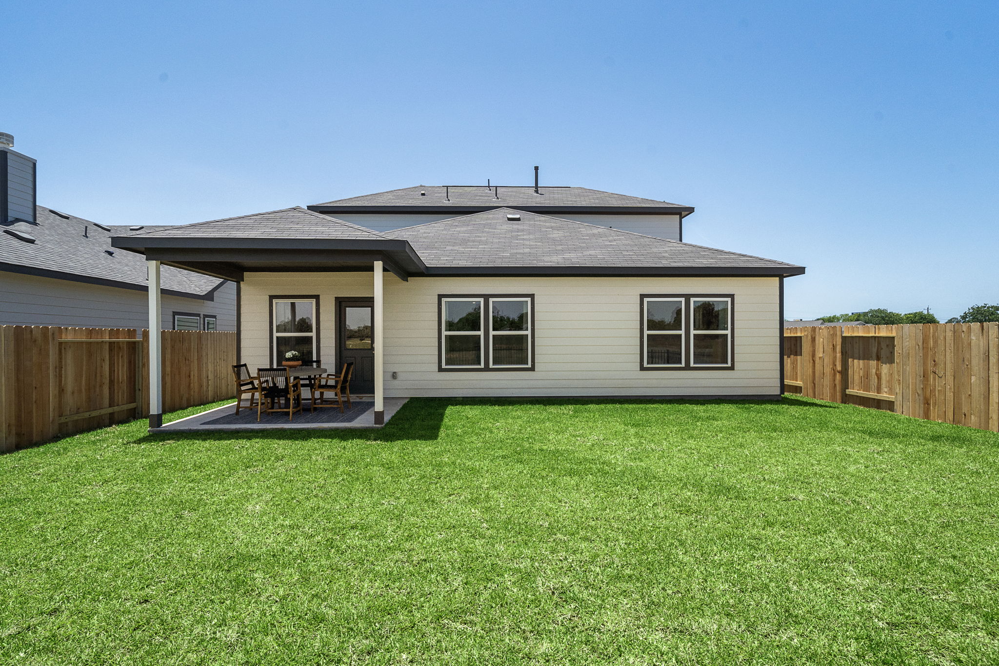 A house with a lawn.