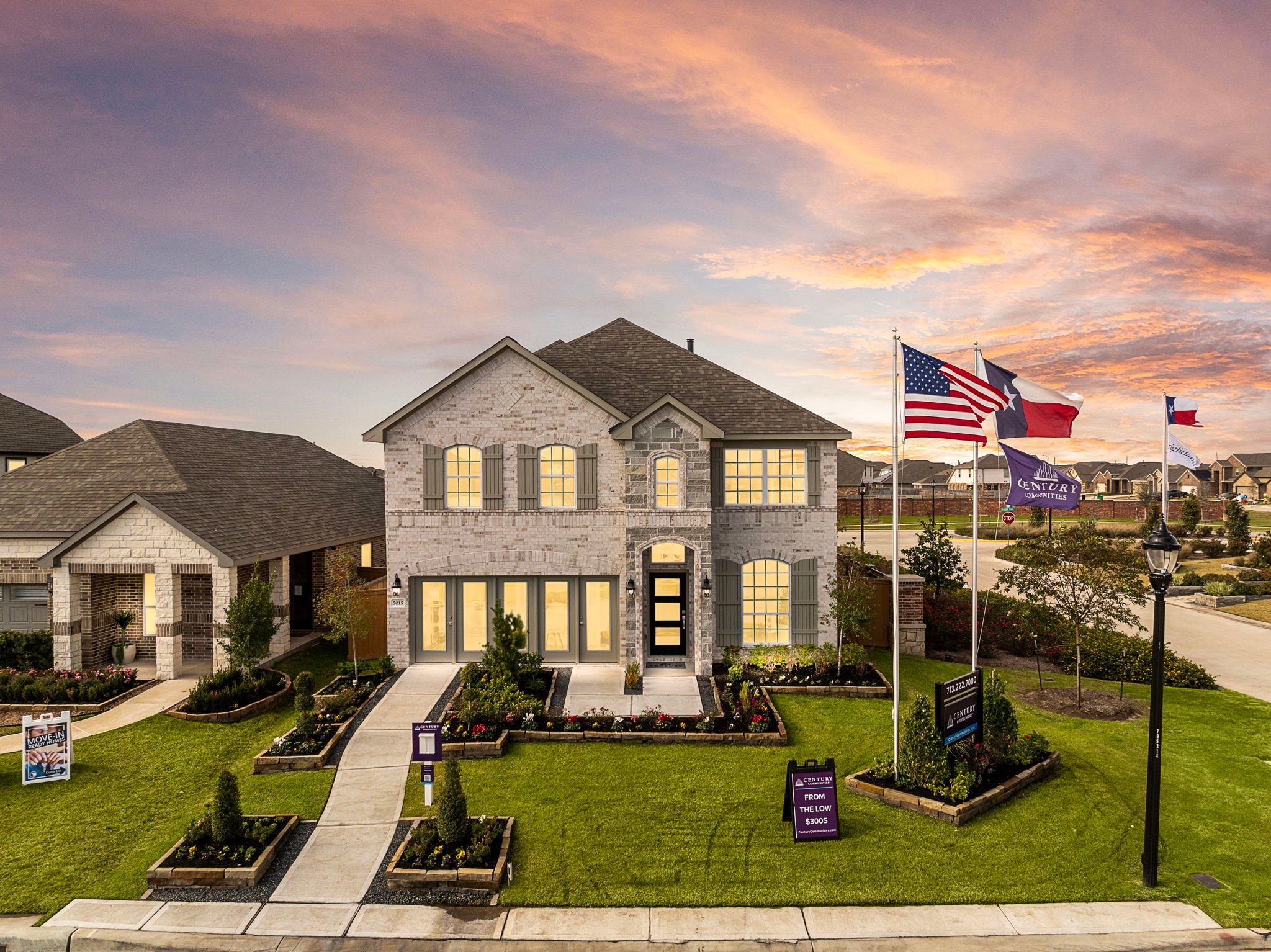 A house with flags in the front.