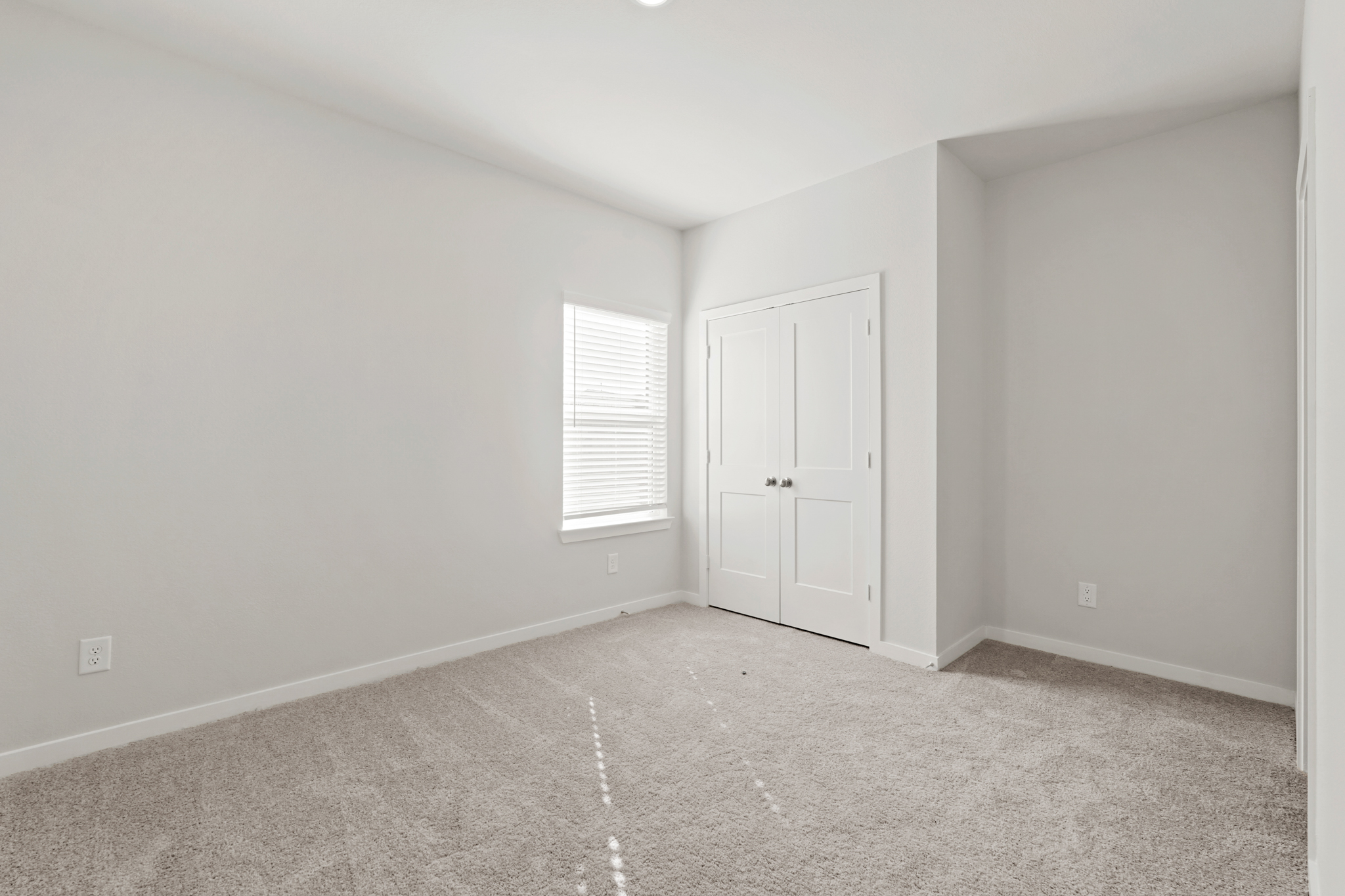 A room with white doors.