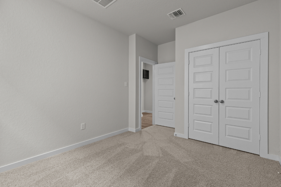 A room with white doors.