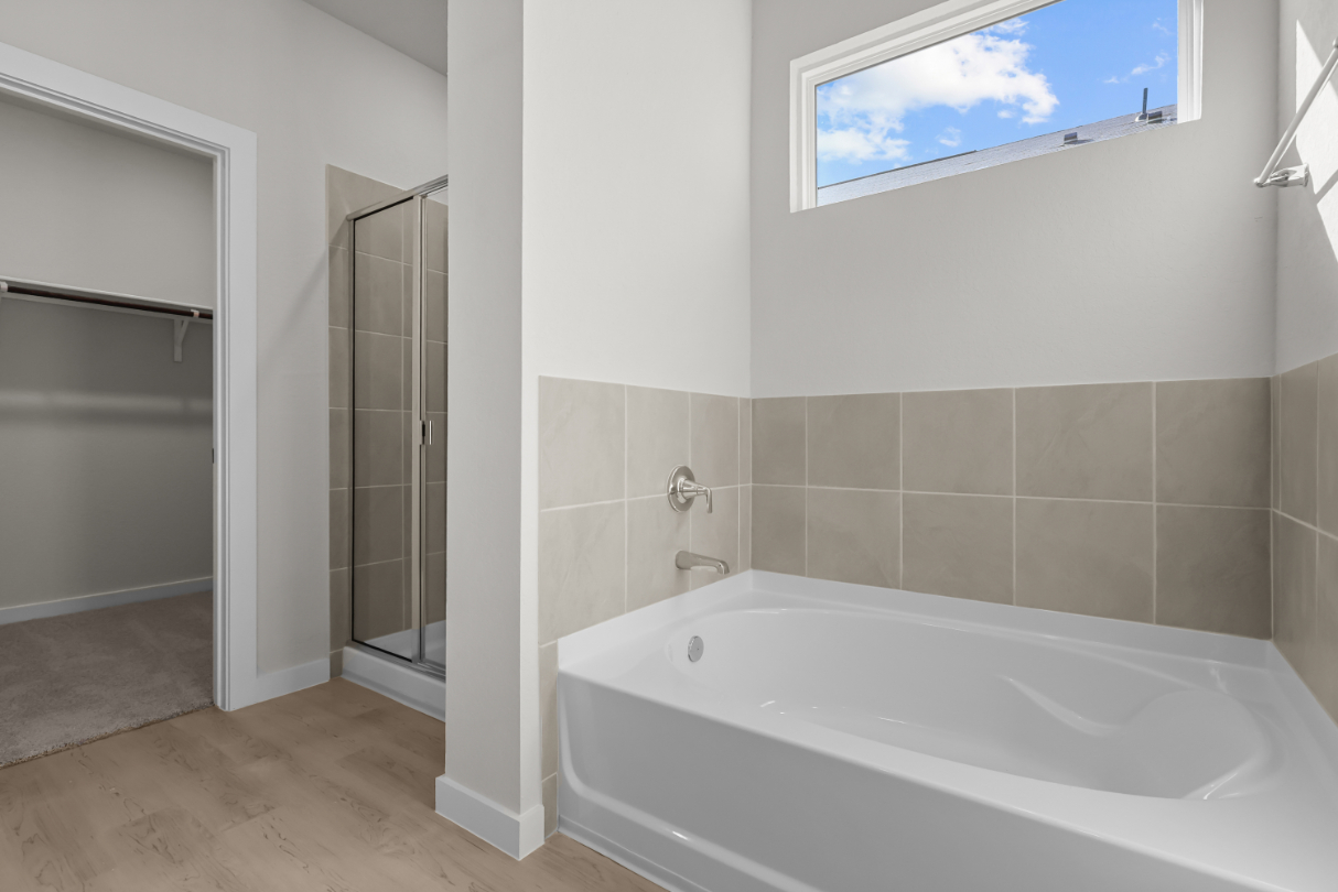 A bathroom with a glass shower.