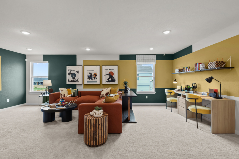 A room with a couch and a table.