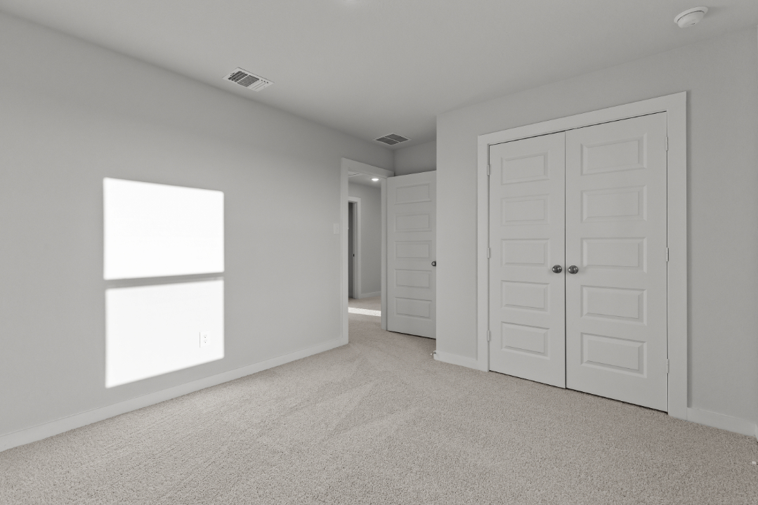 A room with white doors.