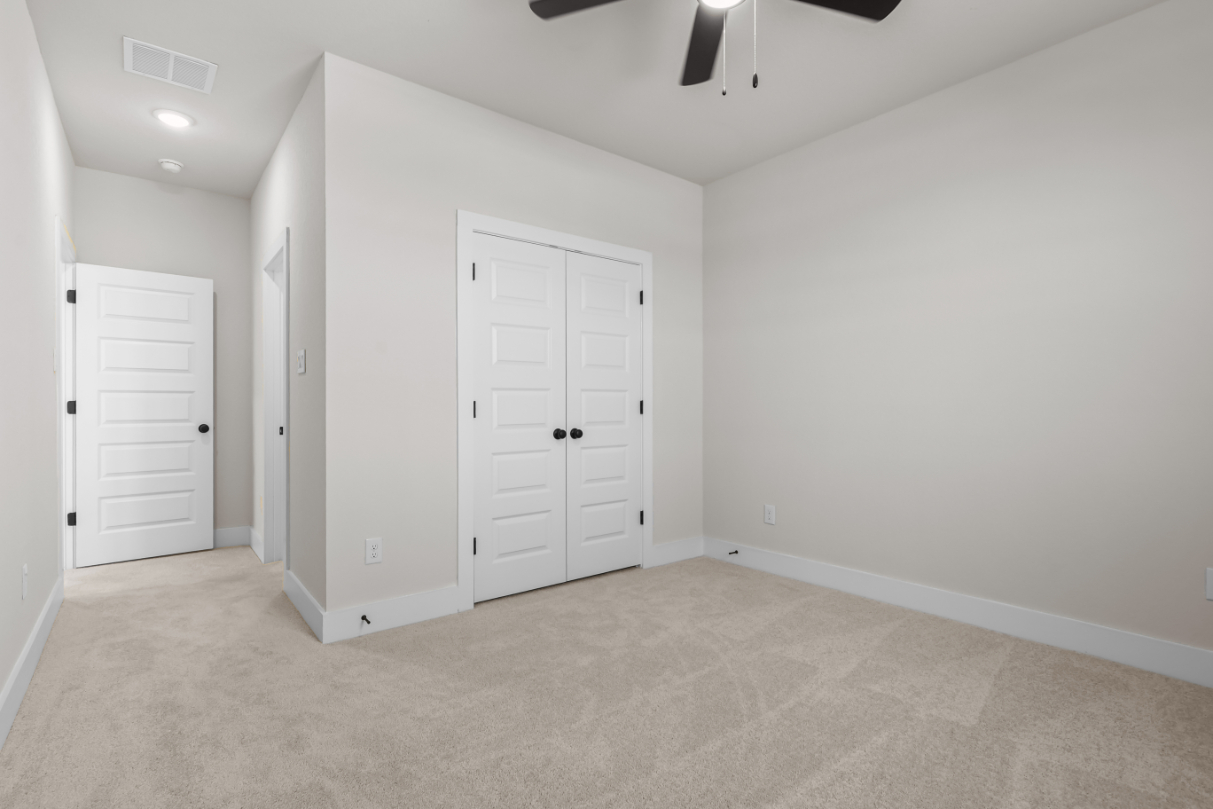 A room with white doors.