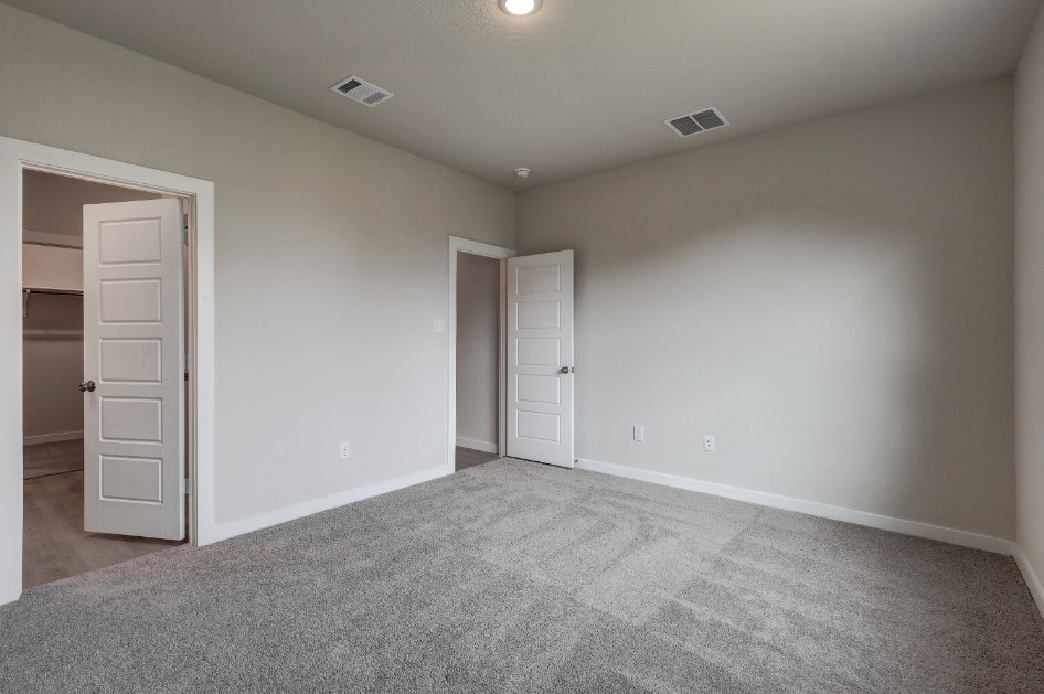 A room with white doors.
