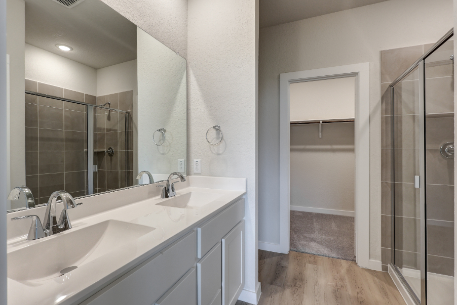 A bathroom with a glass shower.