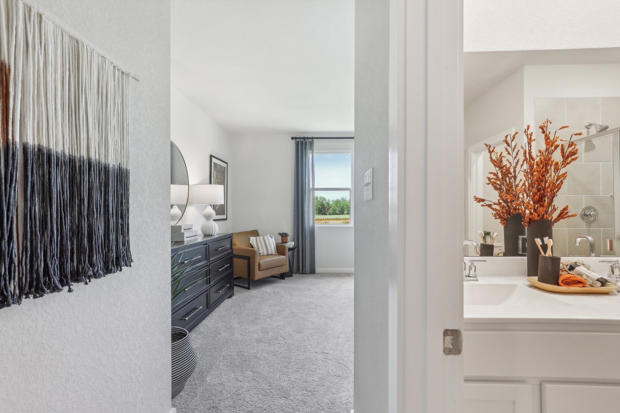 A bathroom with a tub and sink.