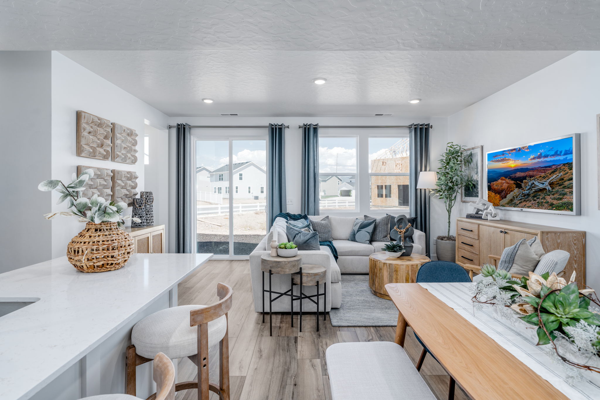 A living room with a large window.