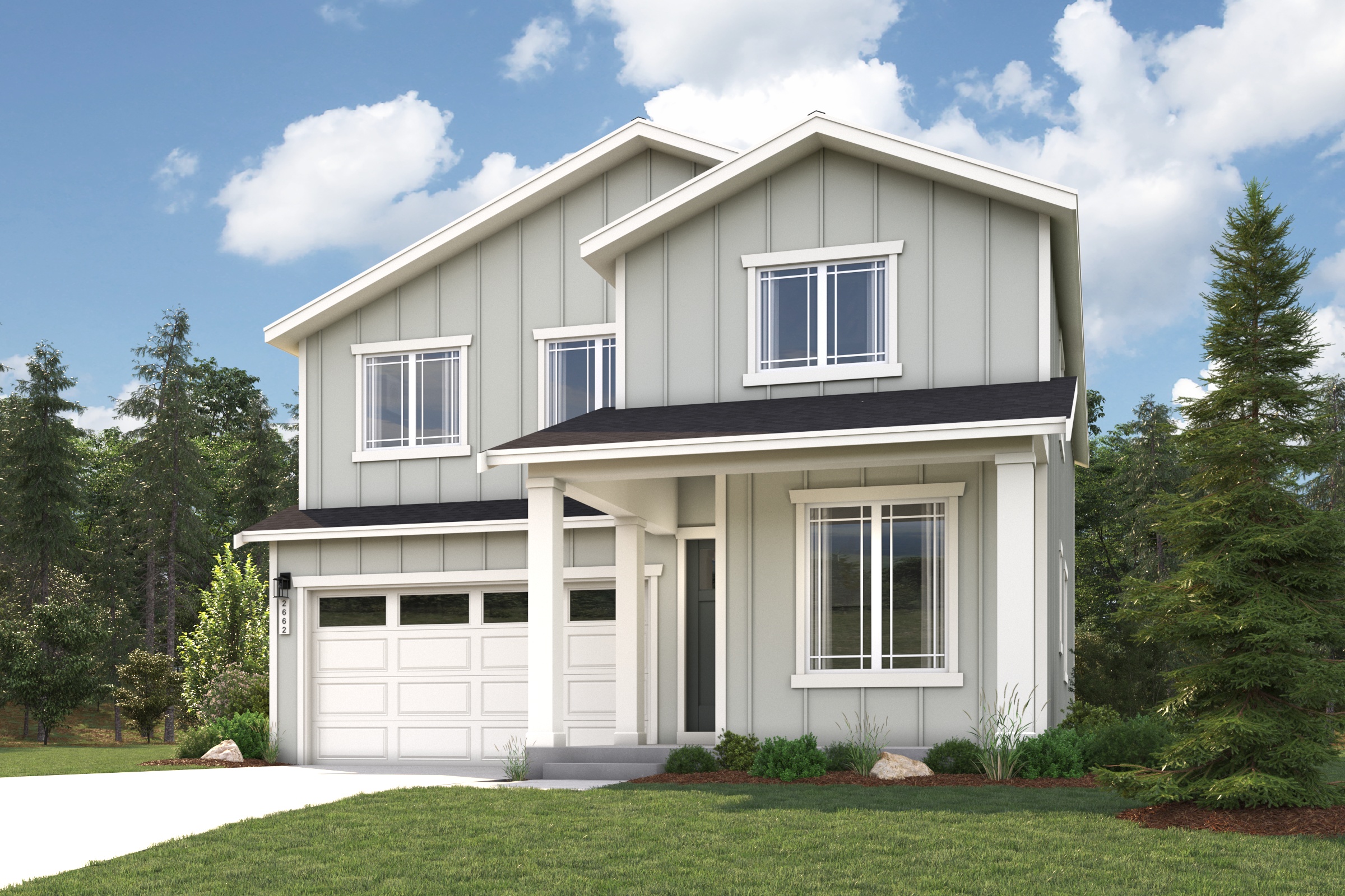 A white house with a garage.