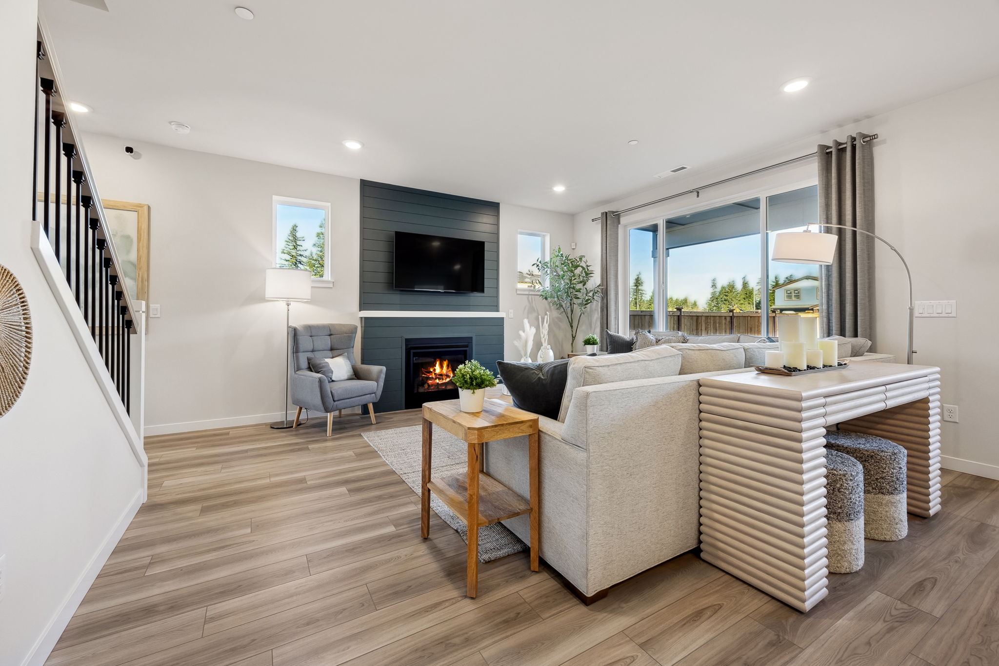 A living room with a fireplace.
