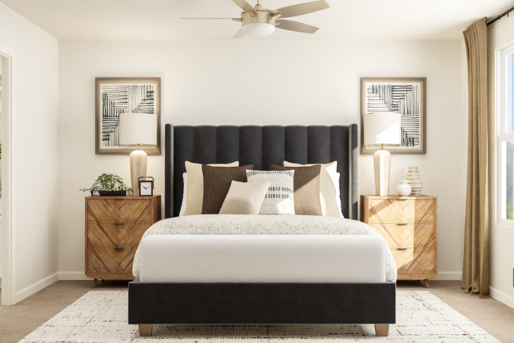 A bedroom with a bed and a fan.