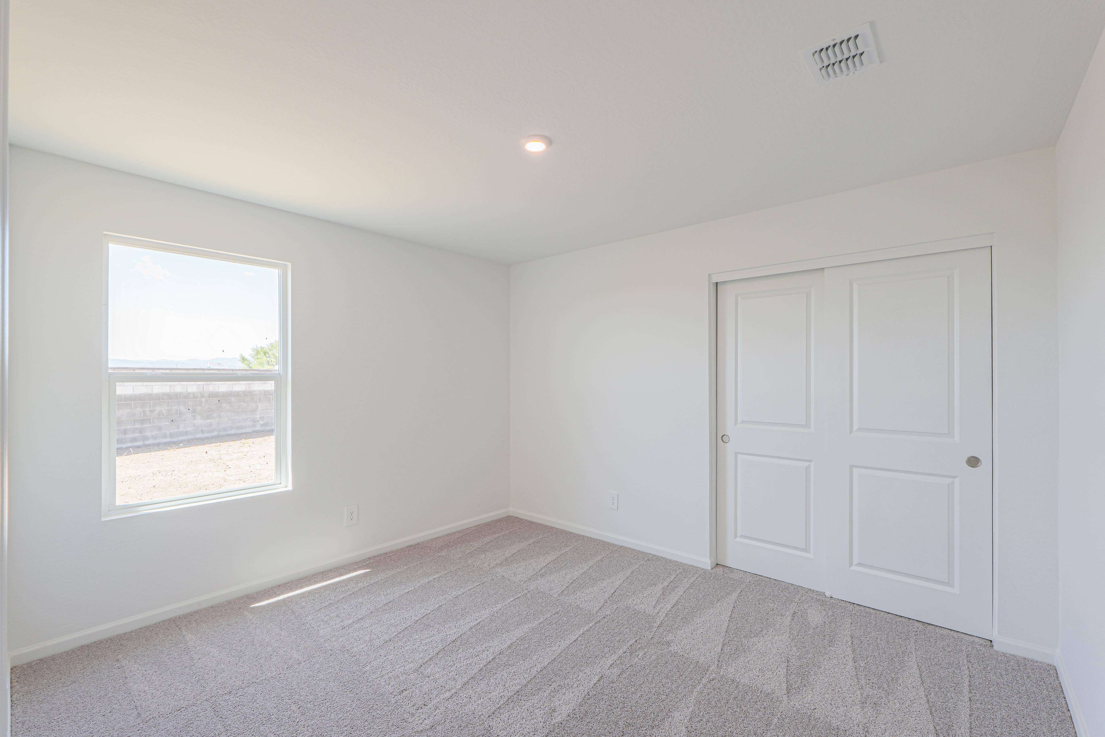 A room with white doors.