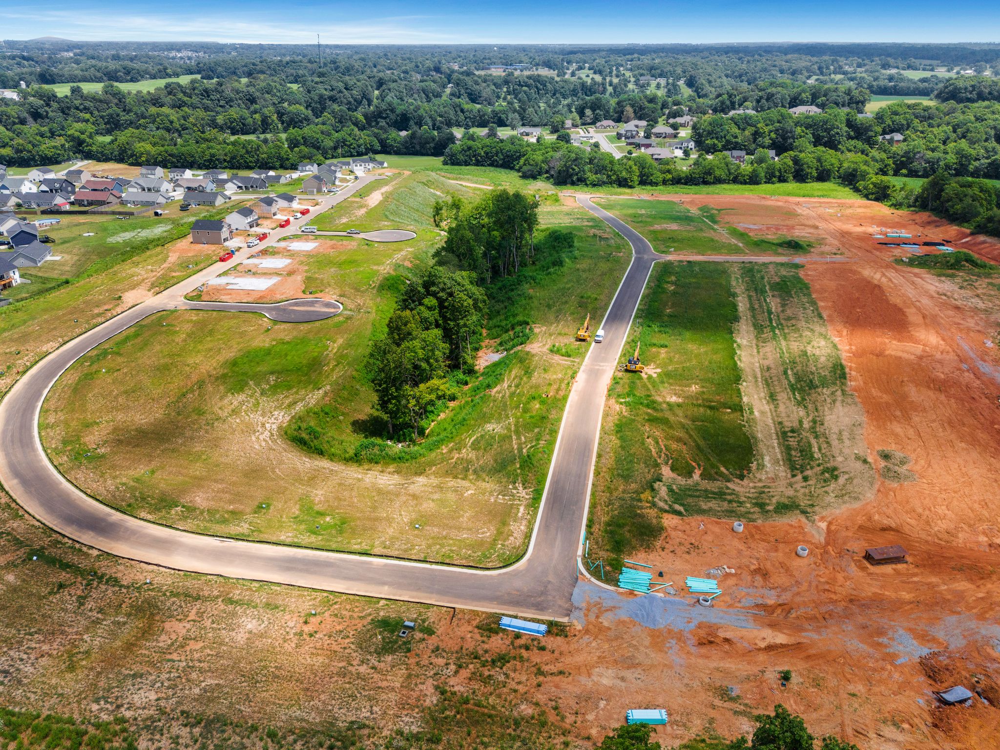 A road with a lot of dirt and trees.
