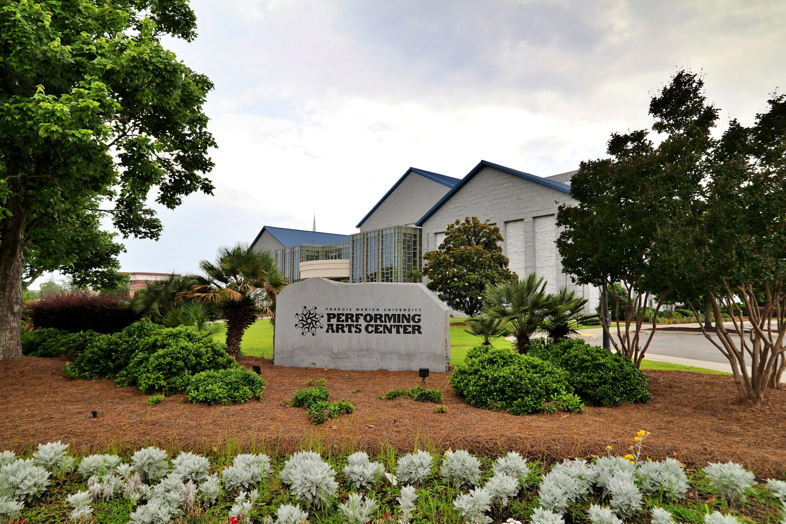 A sign in front of a building.