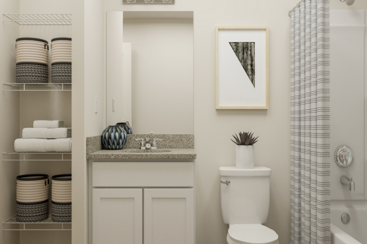 A bathroom with a toilet and a sink.
